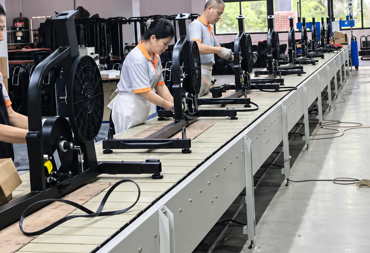 Commercial cardio production line with workers assembling equipment